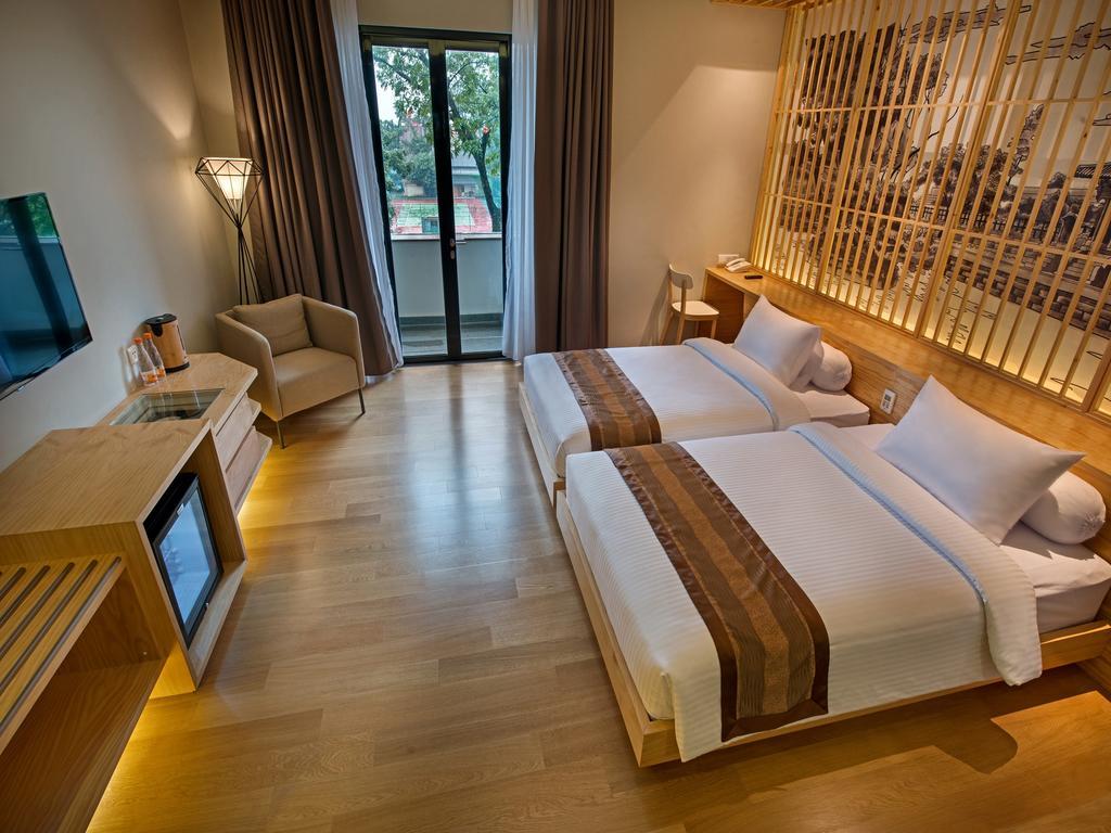בנדונג Tama Boutique Hotel מראה חיצוני תמונה